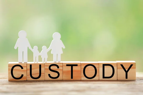 A family on the words CUSTODY